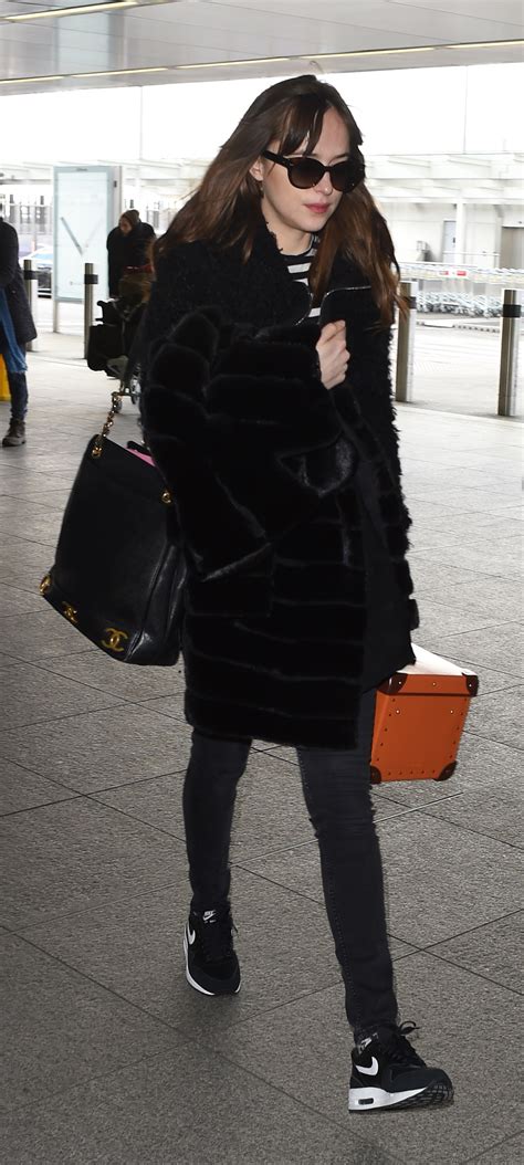 Dakota Johnson’s Airport Style and the Chic Carry